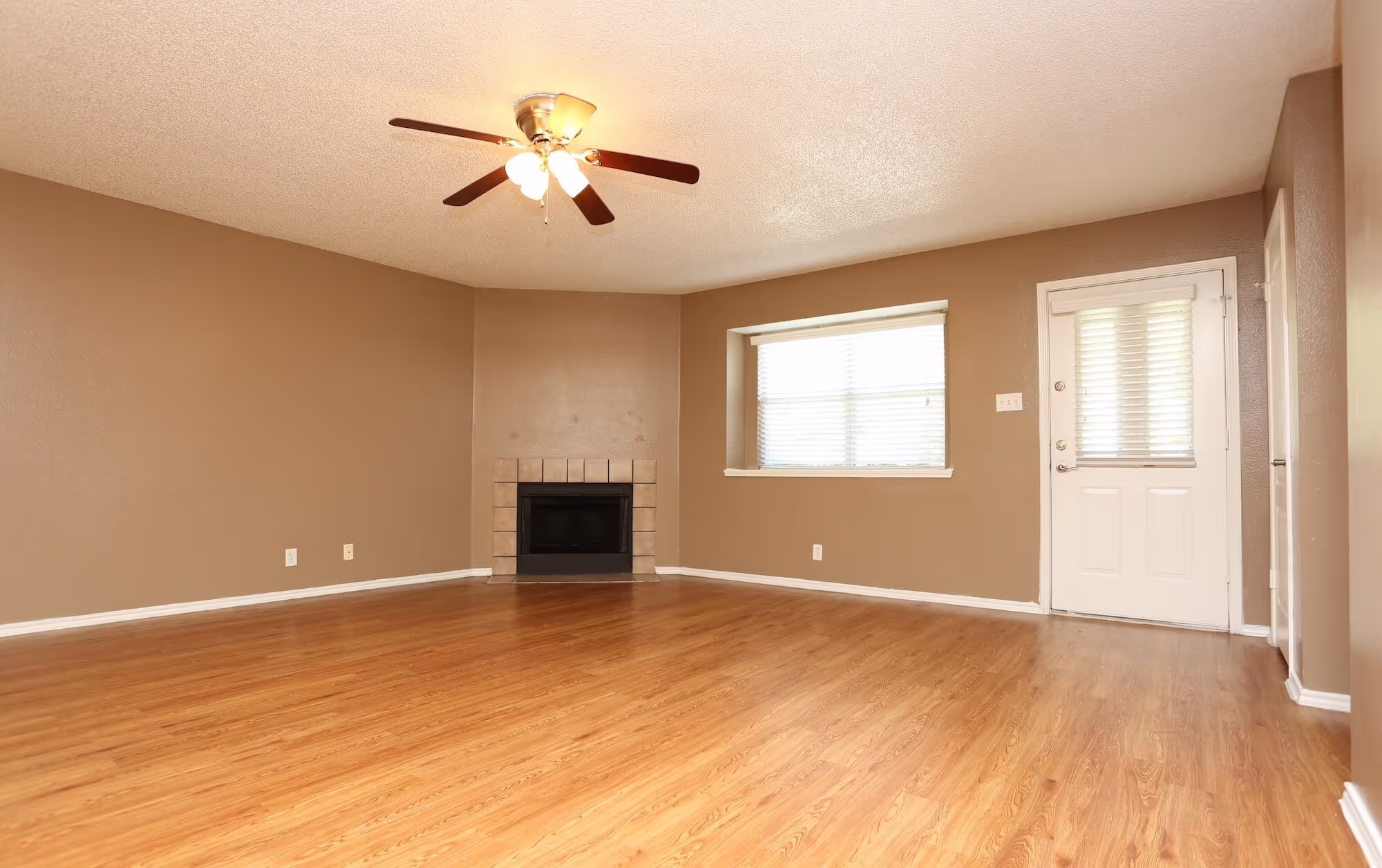 Living room with entrance to patio.